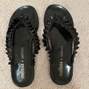 - Melissa and Salinas Flip Flops. Excellent Condition. Size 7